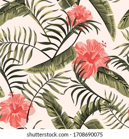 Floral exotic tropical seamless pattern tropic hawaiian wallpaper. Vivid pink hibiscus flowers and green palm banana leaves on a white background. Beach cheerful backdrop.