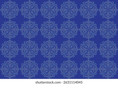 Floral fabric pattern with symmetrical petals in a repeating diamond arrangement on blue background.