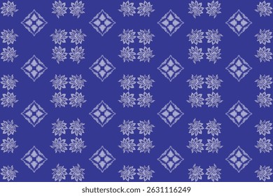 Floral fabric pattern with symmetrical petals in a repeating diamond arrangement on blue white background.
