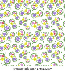 floral with flowers of different colors and green branches seamless pattern