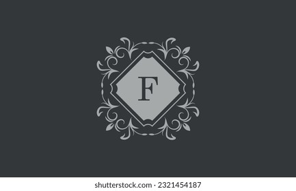 Floral frame with calligraphic elements, letter F. Template for signs, logos, labels, stickers, cards. Graphic design of the page, business.