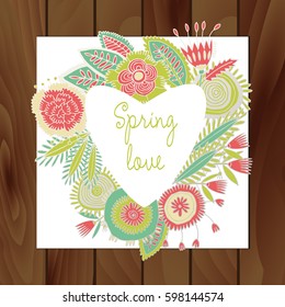 Floral frame heart.Vintage style pastel colors.Postcard on wooden background