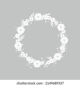 floral frame made of white flowers. round wreath of white petals and herbs.