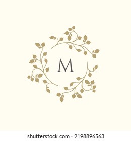 Floral frame monogram. Classic decorative element. Wreath of leaves twigs.