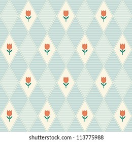 Floral geometric seamless pattern on blue background with repeating tulip