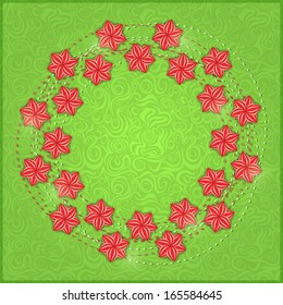 Floral Green Background Card with Bright Red Flowers in Circle .