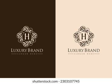 Floral Heraldic or ornamental Luxury circle Logo template .. H letter logo. Good for Restaurant, Royalty, Boutique, Hotel, Jewelry, Fashion ..original vector illustration.