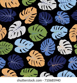 Floral jungle ornament with monstera leaf tropical seamless pattern vector.  Philodendron or monstera plant background. Tropical pattern with jungle leaves decor, seamless background on black.