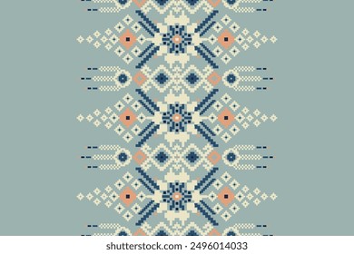 Floral knitted design pattern on blue background vector illustration.knitted embroidery,geometric ethnic pattern traditional.knitted oriental pattern.design for texture,fabric,clothing,decoration.