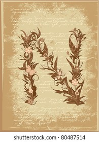 Floral letter on paper grunge