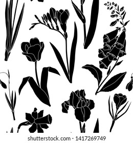 Floral line art. Vector flowers seamless pattern. Hand drawn background. Botanical drawings of tulips, crocus, freesia, iris, narcissus, snowdrops, foxglove.  Garden plants silhouettes.