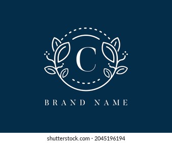Floral logo with letter C. Vector logo template