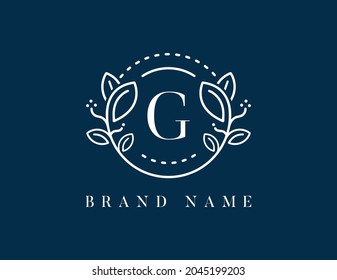 Floral logo with letter G. Vector logo template