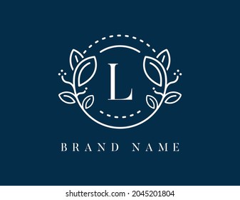 Floral logo with letter L. Vector logo template