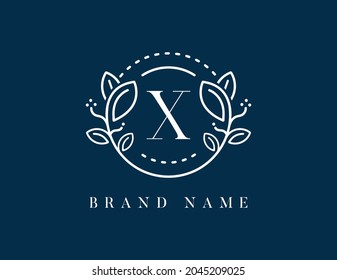 Floral logo with letter X. Vector logo template