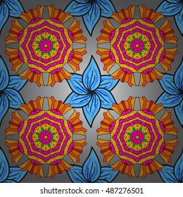 Floral mandala pattern in pink, turquoise green, blue and pale orange on blue background.
