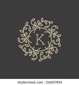 Floral monogram design template with letter K