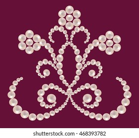 Floral ornament from pearls on a maroon background