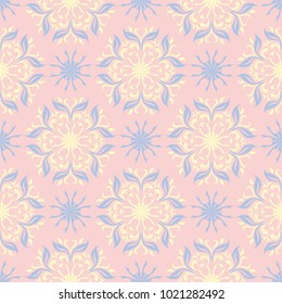 Floral pale pink seamless pattern with blue and beige designs. Background for wallpapers, textile and fabrics
