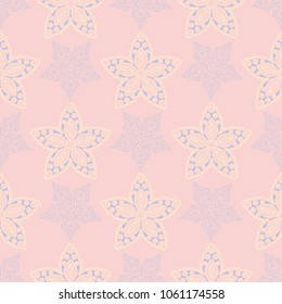 Floral pale pink seamless pattern with blue and beige designs. Background for wallpapers, textile and fabrics