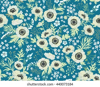 Floral pattern with anemones. Beautiful white flowers. Blue background. Ditsy floral background. The elegant the template for fashion prints. Pastel colors.