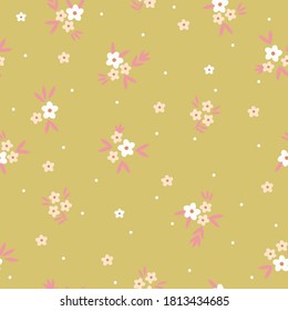 Floral pattern. Beautiful flowers on a mustard background. Print with pale pink and white flowers. Seamless vector texture. Spring bouquet.