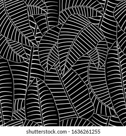 floral pattern of black and white tropical leaves.