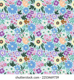 Floral pattern of blue, light yellow and purple flowers on a light turquoise background in cool tones. Rustic chic.