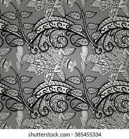 Floral pattern, doodles,bagels, branches, leaves, seamless, copy space . Hand drawn. Gray background. Vector illustration.