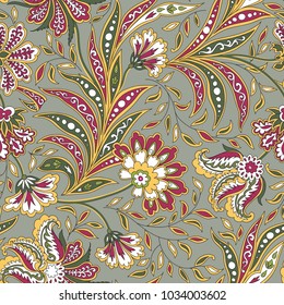 Floral pattern. Flourish tiled oriental ethnic background. Arabic ornament with fantastic flowers and leaves. Wonderland motives of the paintings of ancient Indian fabric patterns.