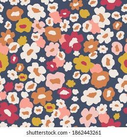 Floral pattern in navy, yellow and pink. Scattered small flowers seamless vector background. Ditsy flower print for textile, home decor, wallpaper, gift wrap.