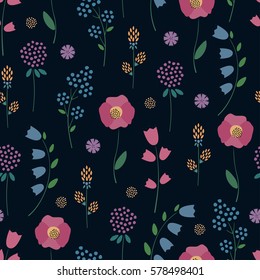 Floral pattern on dark background. Cute colorful flowers seamless background - campanula, clover, poppies. Decorative flowers texture. Design for fabric, wallpaper, textile and decor.