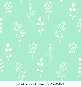 Floral pattern on mint green background. Cute spring white flowers seamless background - campanula, clover, lilac. Decorative flowers texture. Fashion design for fabric, wallpaper, textile and decor.