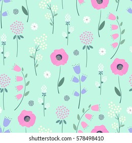 Floral pattern on mint green background. Cute spring colorful flowers seamless background - campanula, clover, poppies. Decorative flowers texture. Design for fabric, wallpaper, textile and decor.