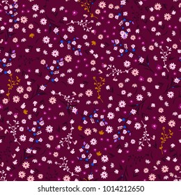 Floral pattern. Pretty flowers on dark violet background in liberty style. Printing with small white flowers. Ditsy print. Seamless vector texture. Spring bouquet.