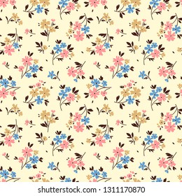 Floral pattern. Pretty flowers on white background. Printing with small blue, pink and yellow flowers. Ditsy print. Seamless vector texture. Spring bouquet.