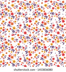 Floral pattern. Pretty flowers on white background. Printing with small red and yellow flowers. Ditsy print. Seamless vector texture. Spring bouquet.