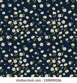 Floral pattern. Pretty flowers on dark blue background. Printing with small white flowers. Ditsy print. Seamless vector texture. Spring bouquet.