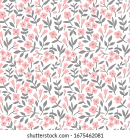 Floral pattern. Pretty flowers on white background. Printing with small pink flowers. Ditsy print. Seamless vector texture. Spring bouquet.