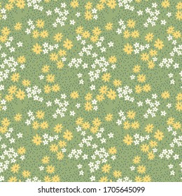 Floral pattern. Pretty flowers on  light green background. Printing with small white and yellow flowers. Ditsy print. Seamless vector texture. Spring bouquet.