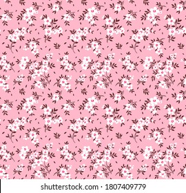 Floral pattern. Pretty flowers on light pink background. Printing with small white flowers. Ditsy print. Seamless vector texture. Spring bouquet.