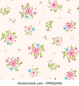 Floral pattern. Pretty flowers on light pink background. Printing with Small-scale pink flowers. Ditsy style print. Seamless vector texture. Spring bouquet.