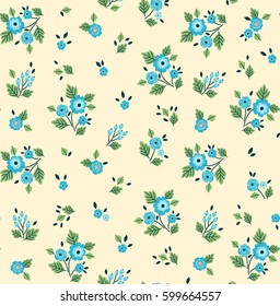 Floral pattern. Pretty flowers on whit background. Printing with Small-scale blue flowers. Ditsy style print. Seamless vector texture. Spring bouquet.