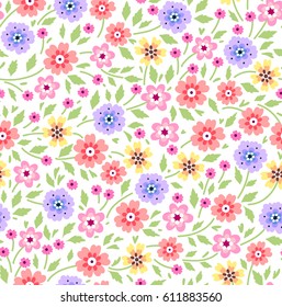 Floral pattern. Pretty flowers on white background. Printing with small-scale multicolored flowers. Ditsy print. Seamless vector texture. Spring bouquet.