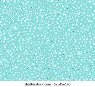 Floral pattern. Pretty flowers on pale blue background. Printing with small white flowers. Ditsy print. Seamless vector texture. Spring bouquet.