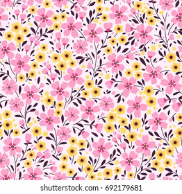 Floral pattern. Pretty flowers on dark white background. Printing with small pink and yellow flowers. Ditsy print. Seamless vector texture. Spring bouquet.