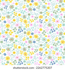 Floral pattern with small colorful cute flowers on a white background. Vintage pastel color pretty yellow, pink, blue tiny flowers. Ditsy print design