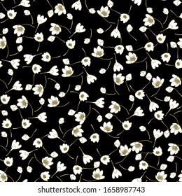 Floral pattern. Small flowers on dark background.  Seamless vector texture.