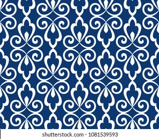 Floral pattern. Vintage wallpaper in the Baroque style. Seamless vector background. White and blue ornament for fabric, wallpaper, packaging. Ornate Damask flower ornament