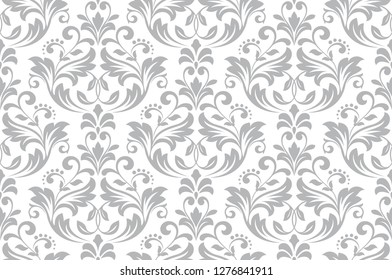 Floral pattern. Vintage wallpaper in the Baroque style. Seamless vector background. White and grey ornament for fabric, wallpaper, packaging. Ornate Damask flower ornament,